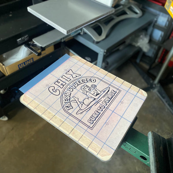 Chix Fresh Squeezed test print on the press pallet for registration at RVA Threads screen printing, Virginia