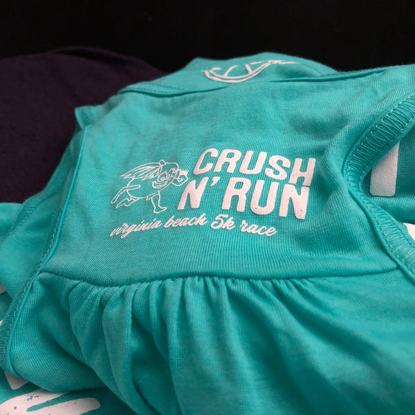 Crush N' Run 5K logo in white ink on a teal tank top, laid flat at RVA Threads screen printing, Virginia