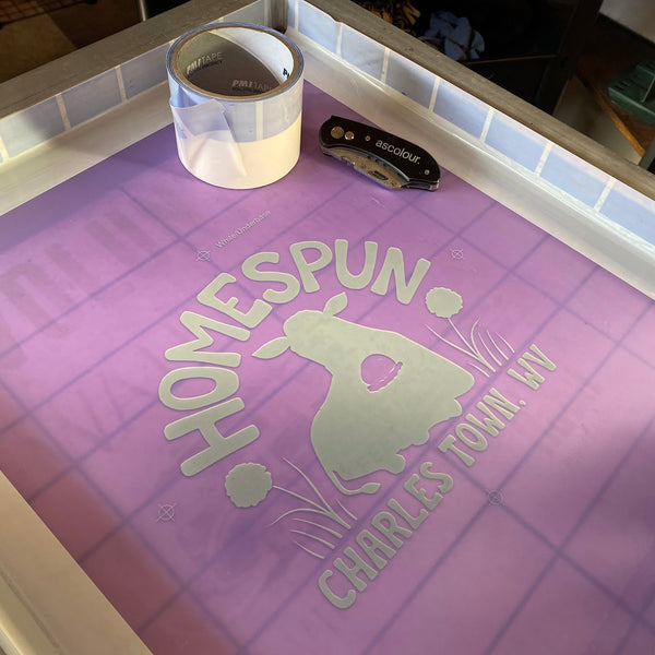 Homespun calf design screen taped and ready to print on the press at RVA Threads screen printing, Virginia
