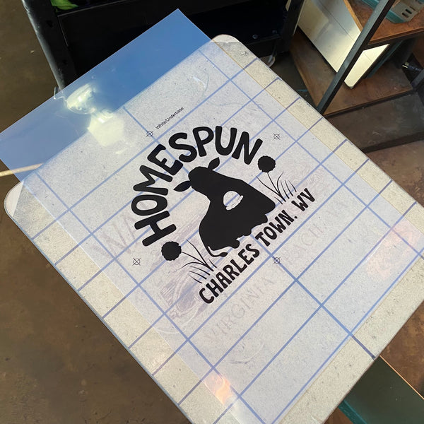 Homespun Charles Town, WV calf design film positive on the press pallet at RVA Threads screen printing, Virginia