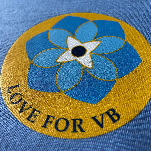 Love For VB flower design in blue and gold ink on a blue tee at RVA Threads screen printing, Virginia