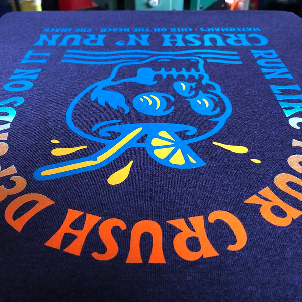 Run Like Your Crush Depends On It Crush N' Run design on a purple tee at RVA Threads screen printing, Virginia