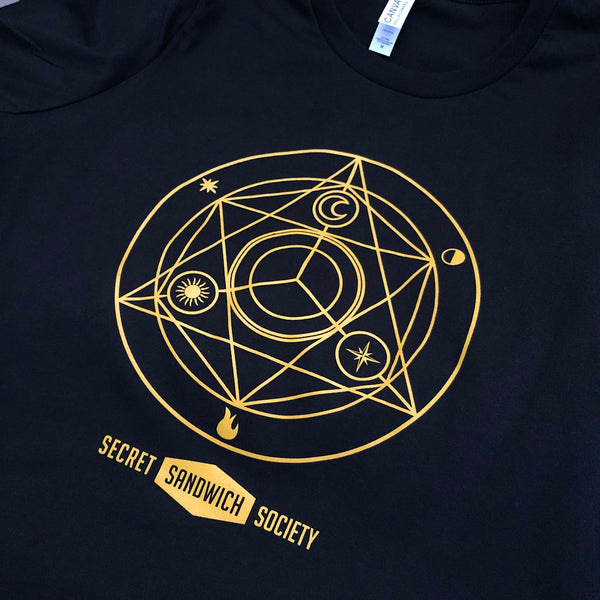Secret Sandwich Society geometric design in gold ink on a navy tee at RVA Threads screen printing, Virginia