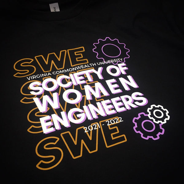 Society of Women Engineers SWE design in gold, white and purple ink on a black tee at RVA Threads screen printing, Virginia