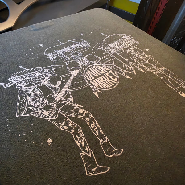 Full Union Market sandwich band print in white ink on a Pepper Comfort Colors 1717 tee on the platen at RVA Threads screen printing, Virginia
