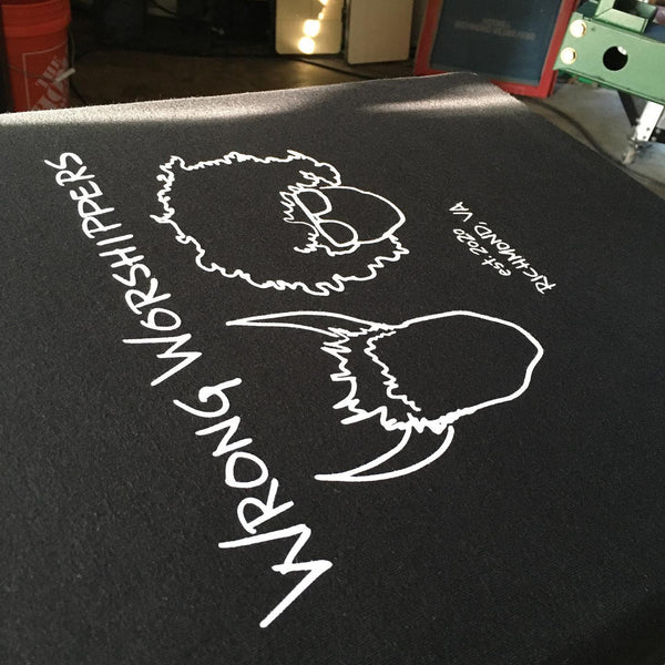 Wrong Worshippers line art design in white ink on a black tee at RVA Threads screen printing, Virginia
