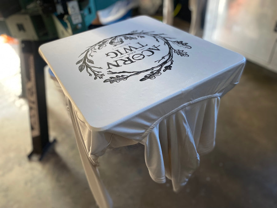 Acorn and Twig Arborists shirt on the press at RVA Threads screen printing, Virginia