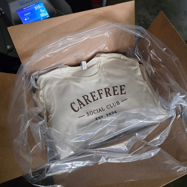 Carefree Social Club shirts folded and boxed for delivery at RVA Threads screen printing, Virginia