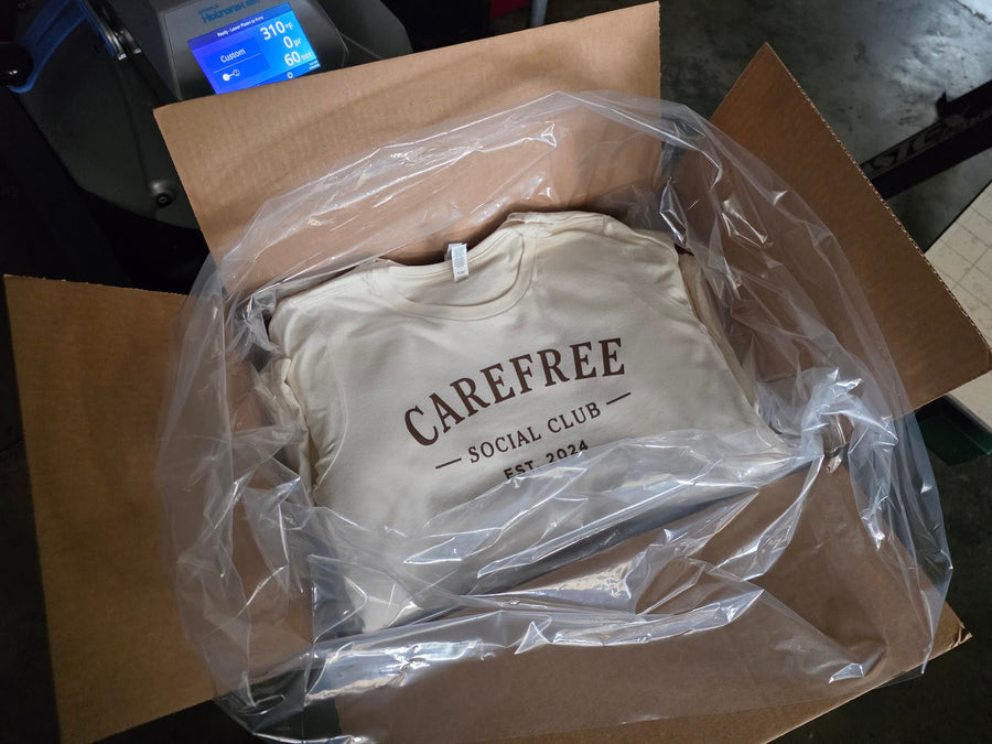 Carefree Social Club shirts folded and boxed for delivery at RVA Threads screen printing, Virginia