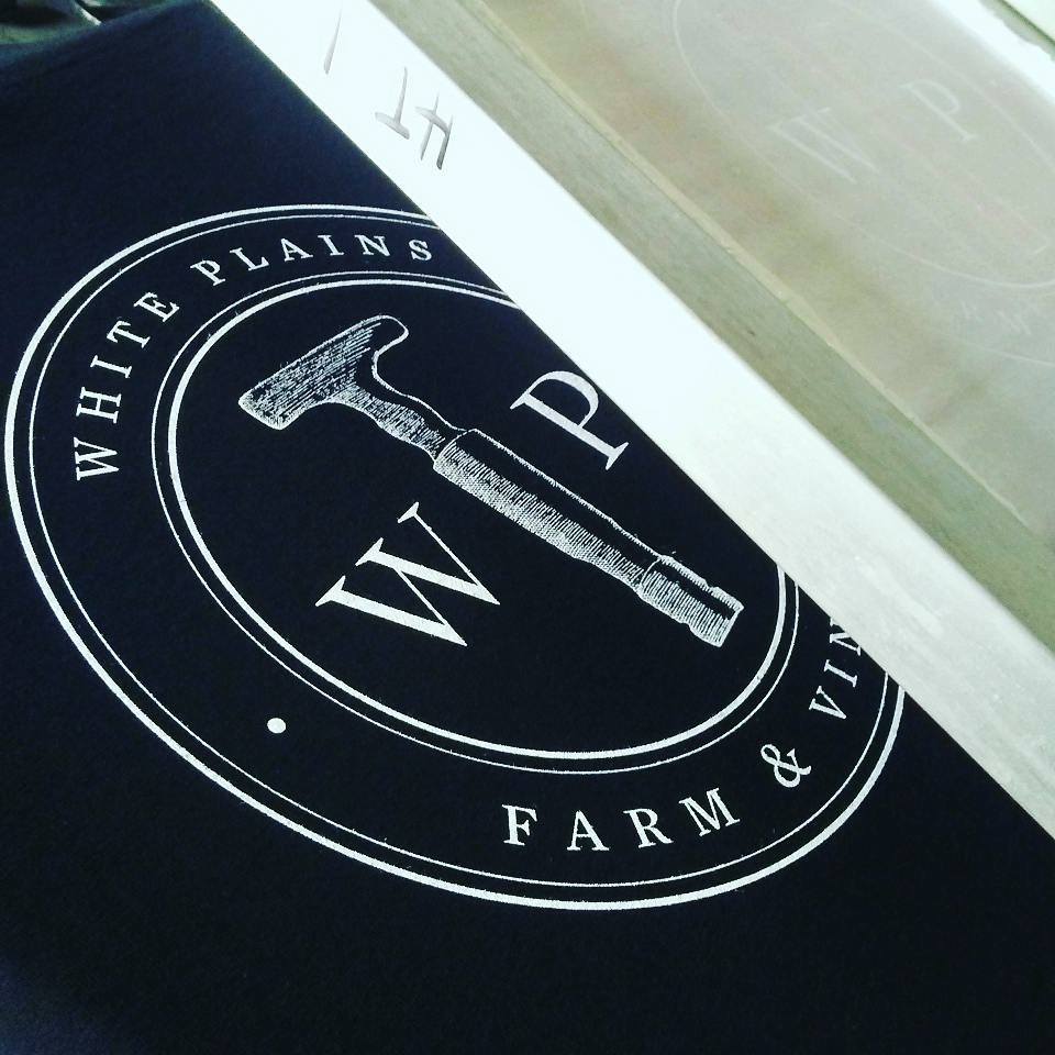 Custom screen printed shirts for White Plains Farm & Vineyard. 