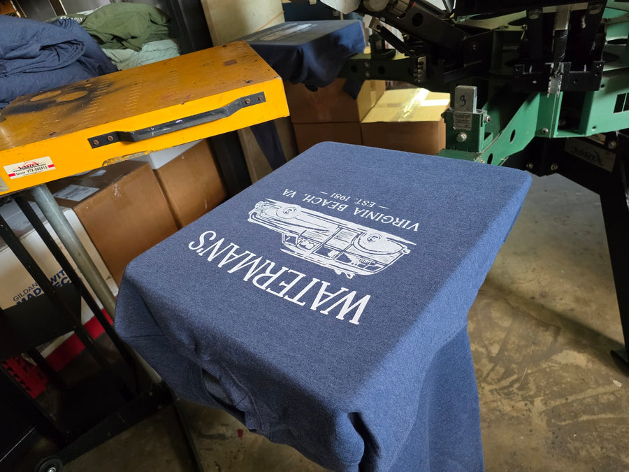 Waterman's Virginia Beach shirt on the press under the flash dryer at RVA Threads screen printing, Virginia