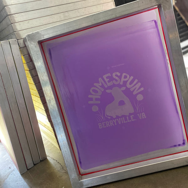 Burned Homespun screens stacked and ready to load on the press at RVA Threads screen printing, Virginia
