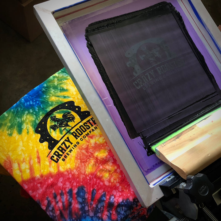 Finished Crazy Rooster Brewing tie-dye t-shirt, screen printed by RVA Threads