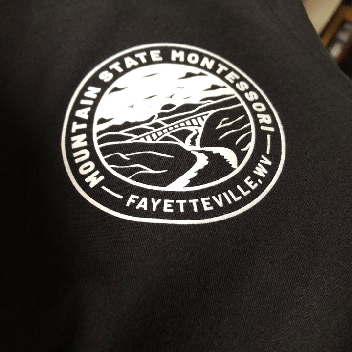 Finished Mountain State Montessori t-shirt, screen printed by RVA Threads