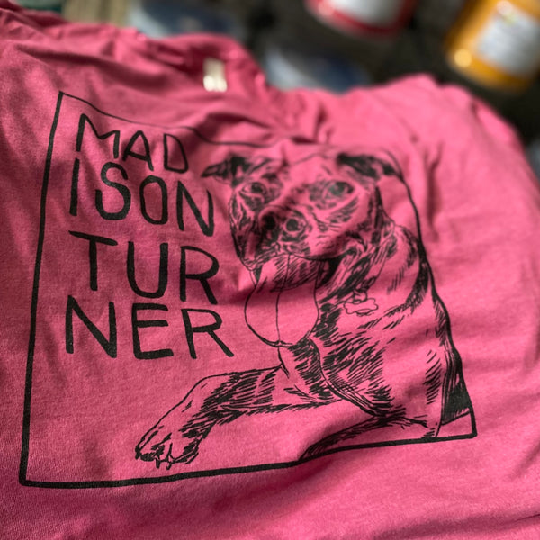Dog portrait design in black ink on a heather maroon tee, laid flat after printing at RVA Threads screen printing, Virginia