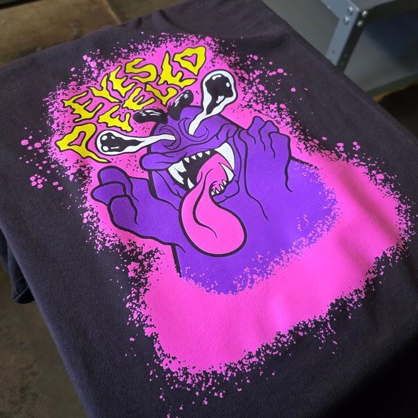 Eyes Peeled print in pink, purple, yellow and white ink on a Black Comfort Colors 1717 tee at RVA Threads screen printing, Virginia