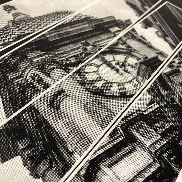 Halftone clock tower illustration printed in black ink, close up of the detail at RVA Threads screen printing, Virginia
