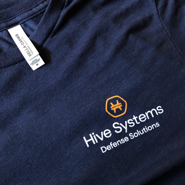 Hive Systems Defense Solutions logo in orange and white ink on a navy tee at RVA Threads screen printing, Virginia