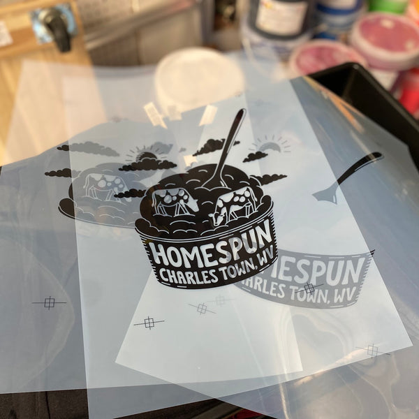 Homespun Charles Town, WV film positives stacked and ready to burn screens at RVA Threads screen printing, Virginia