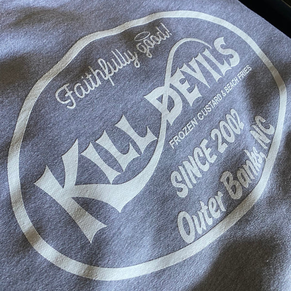 Kill Devils Outer Banks, NC logo in white ink on a heather blue tee at RVA Threads screen printing, Virginia