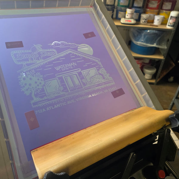 Lemon Drop Inn and Waterman Spirits screen with a wood squeegee, ready on the press at RVA Threads screen printing, Virginia