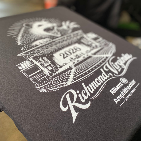 Richmond, Virginia opossum design for Allianz Amphitheater in white ink on a black tee on the pallet at RVA Threads screen printing, Virginia