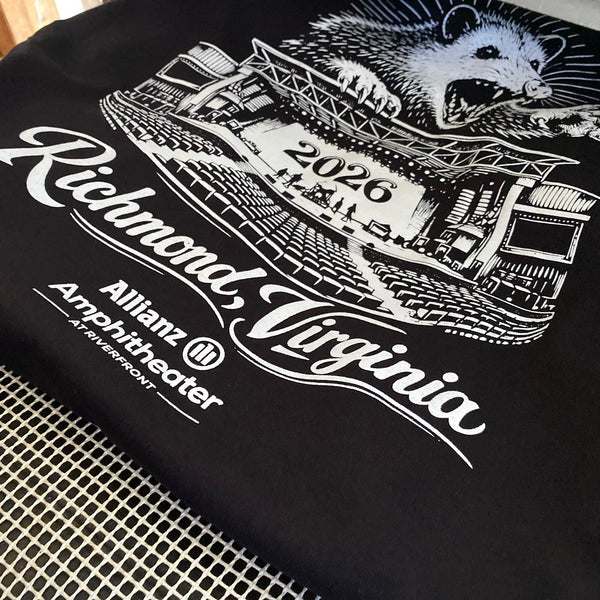 Richmond, Virginia 2026 opossum design for Allianz Amphitheater in white ink on a black tee, laid flat at RVA Threads screen printing, Virginia