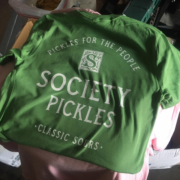 Society Pickles Classic Sours logo in white ink on a green tee at RVA Threads screen printing, Virginia