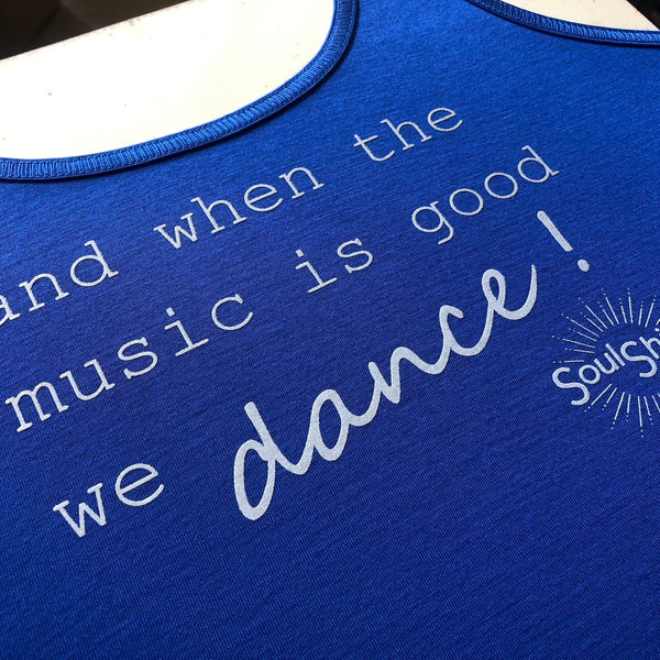 Soulshine And When The Music Is Good We Dance lettering in white ink on a royal blue tank at RVA Threads screen printing, Virginia