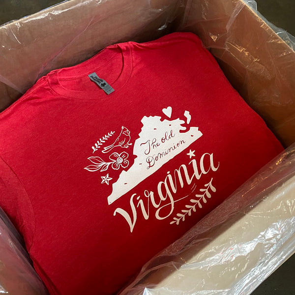 Virginia design tees in white ink on red, packed in a lined box for delivery at RVA Threads screen printing, Virginia