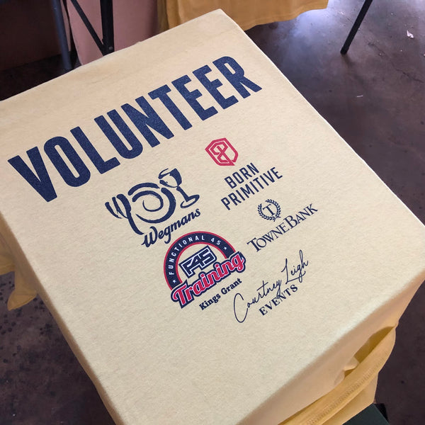Volunteer sponsor back print in navy and red ink on a natural tee at RVA Threads screen printing, Virginia