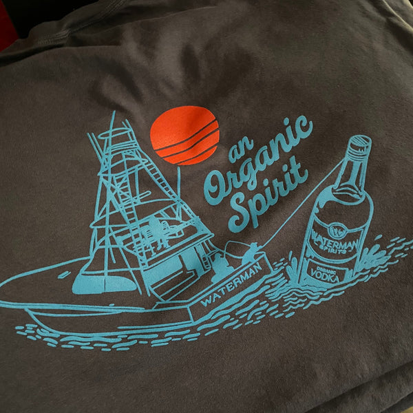 Waterman Spirits An Organic Spirit design in teal and orange ink on a charcoal tee at RVA Threads screen printing, Virginia