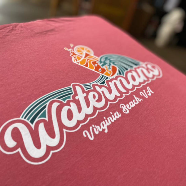 Waterman's Virginia Beach script logo in full color on a red tee at RVA Threads screen printing, Virginia