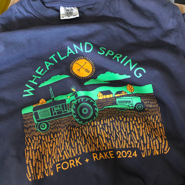 Wheatland Spring Fork + Rake 2024 tractor design in full color on a navy tee at RVA Threads screen printing, Virginia