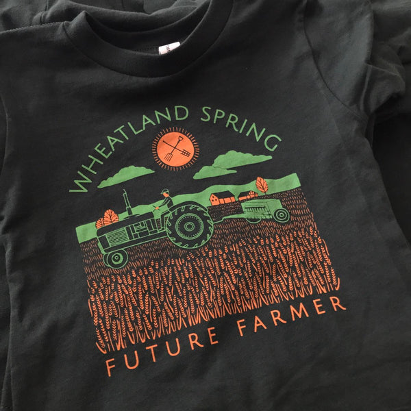 Wheatland Spring Future Farmer tractor design in full color on a black tee at RVA Threads screen printing, Virginia